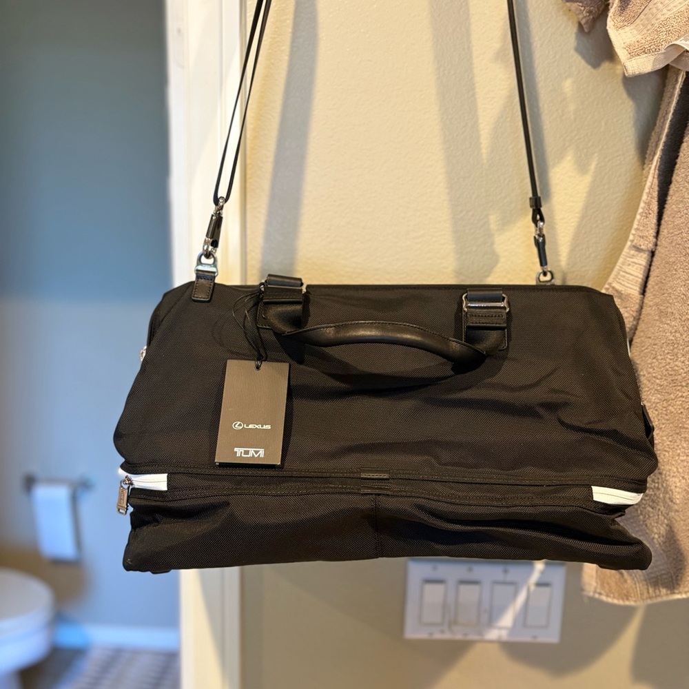 Tumi framed Lexus travel bag